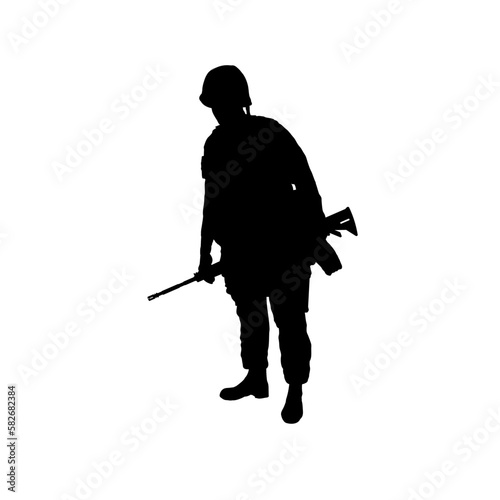 Black silhouette of an American soldier with a rifle over his shoulder