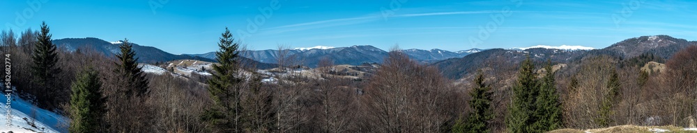 Mountains range panorama. Mountains and blue sky