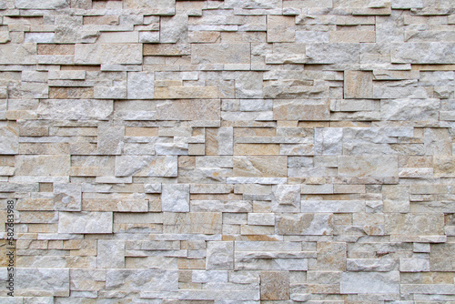 Facade of stone slabs in light colors