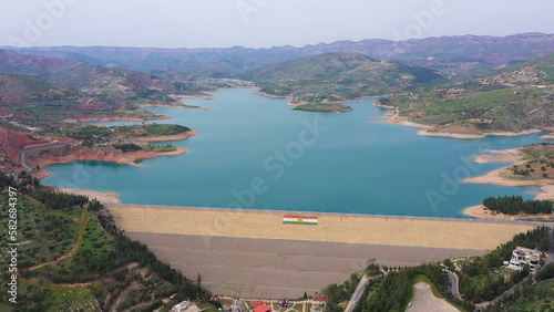 The Duhok Dam is an earth-fill embankment dam on the Duhok River just north of Duhok in Duhok Governorate, Iraq photo