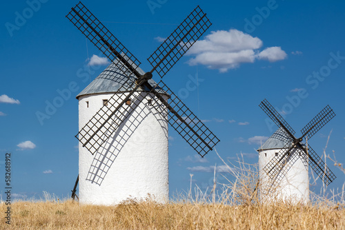 Two ancient windmills in Campo de Criptana defined in Cervantes' Don Quixote 