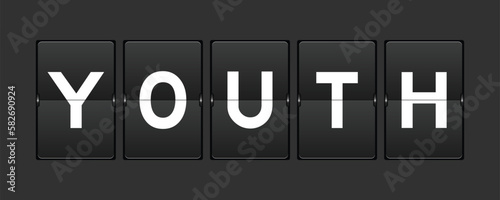 Black color analog flip board with word youth on gray background