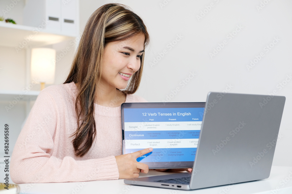 Woman study english language online by laptop computer, learning online course Woman study english language online by laptop computer, learning online course