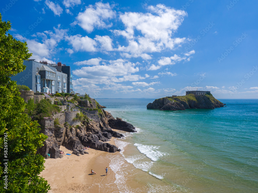 Beach with hills (Castle Beach, Tenby, Wales, United Kingdom, in summer)