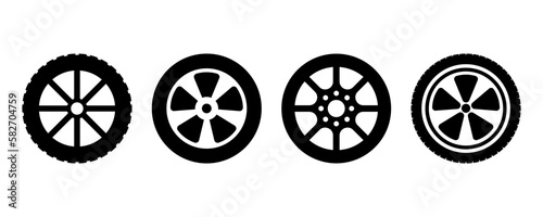 Set of car tire vector icons on white background. Black silhouette with vehicle wheel and protector. Vector 10 Eps.