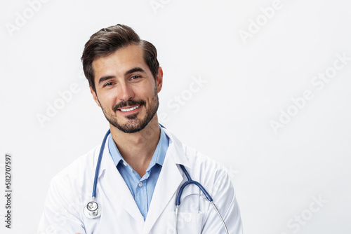 Man doctor in white coat with stethoscope and wearing glasses for vision smile with teeth on white isolated background looking into camera, copy space, space for text, health