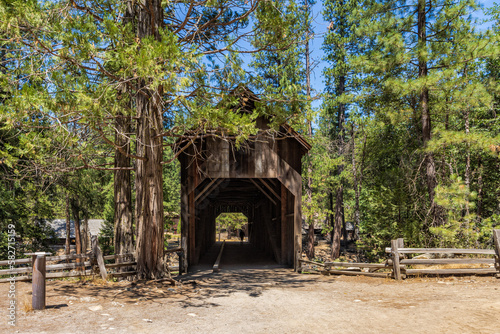Fototapeta Naklejka Na Ścianę i Meble -  Wawona historic covered bridge in Yosemite National Park, in the Pioneer Yosemite History Center.