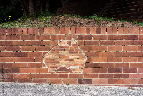 map of australia in brick wall, minus tasmania photo