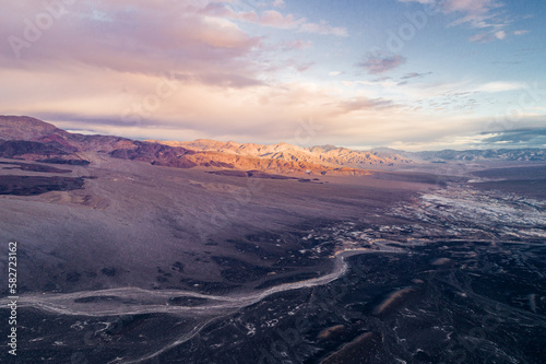 Sunrise in Ubehebe Crater. Death Valley, California. Beautiful Morning Colors and Colourful Landscape in Background. Sightseeing Place. Drone Viewpoint.