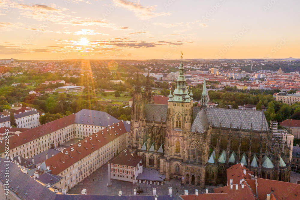 Sunset in Prague Old Town with St. Vitus Cathedral and Prague castle complex with buildings revealing architecture from Roman style to Gothic 20th century. Prague, capital city of the Czech Republic