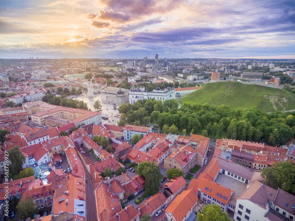 Vilnius Old Town Beautiful Sunset and Cityscape. Cathedral, Gediminas Castle and Beautiful Sky in Background. Capital of Lithuania, member of European Union. Cathedral Square and Gediminas Castle