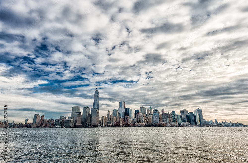 Hudson River and Manhattan Cityscape with One World Trade Center in Background. NYC, USA