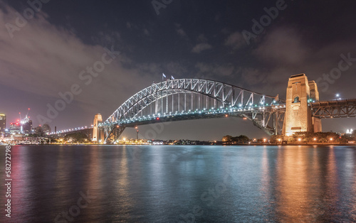 Sydney Harbour Bridge at Night. Long Exposure. Flowing Sky. Australia © Mindaugas Dulinskas