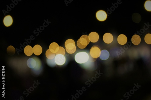 Blur background of sparkling lights with dark background © rizki dian pratama