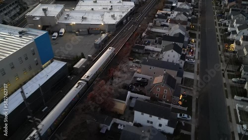 Aerial view of the railroad surrounded by buildings in Long Island, NY photo