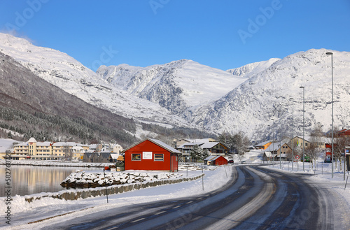 View of the village of Skei and lake Jolstravatnet, in Sunnfjord Municipality, Vestland county, Norway. Scenic landscape in winter, with reflections on the water. 