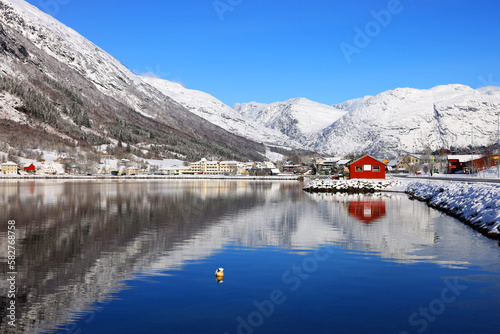 View of the village of Skei and lake Jolstravatnet, in Sunnfjord Municipality, Vestland county, Norway. Scenic landscape in winter, with reflections on the water.
 photo