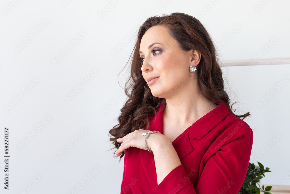 Fashionable and stylish woman in trendy jewelry big earrings . Fashion look beauty and style. Natural makeup and easy styling Fashionable and stylish woman in trendy jewelry big earrings . Fashion look beauty and style. Natural makeup and easy styling