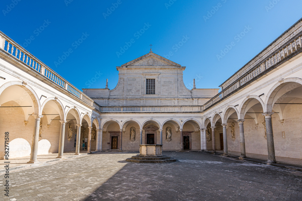 The marvelous cloister of Montecassino Abbey on a sunny morning, Lazio, Italy.