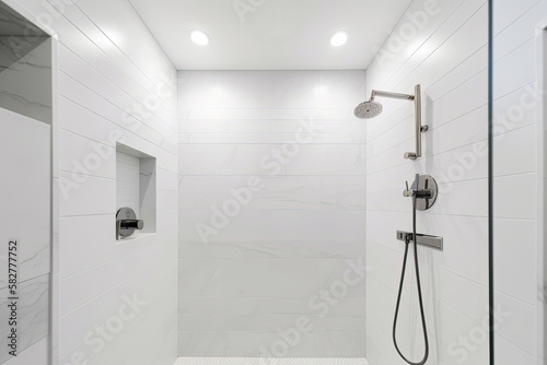 A sleek and compact shower with minimalist design  featuring clean lines and simple yet elegant fixtures - Generative AI