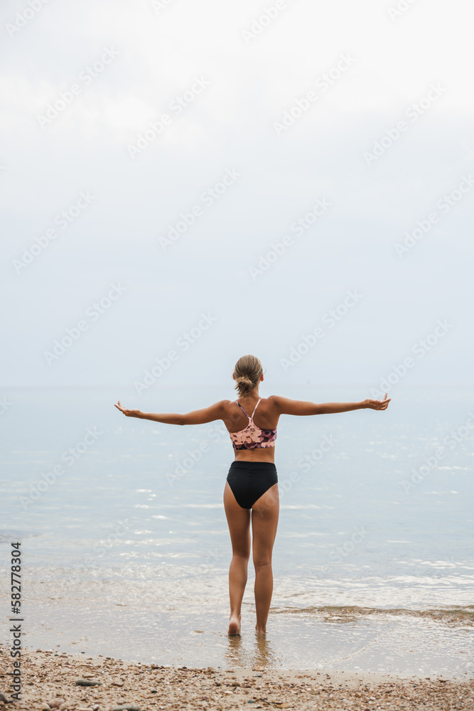 Teenager Girl Enjoying A Summer Day At The Beach