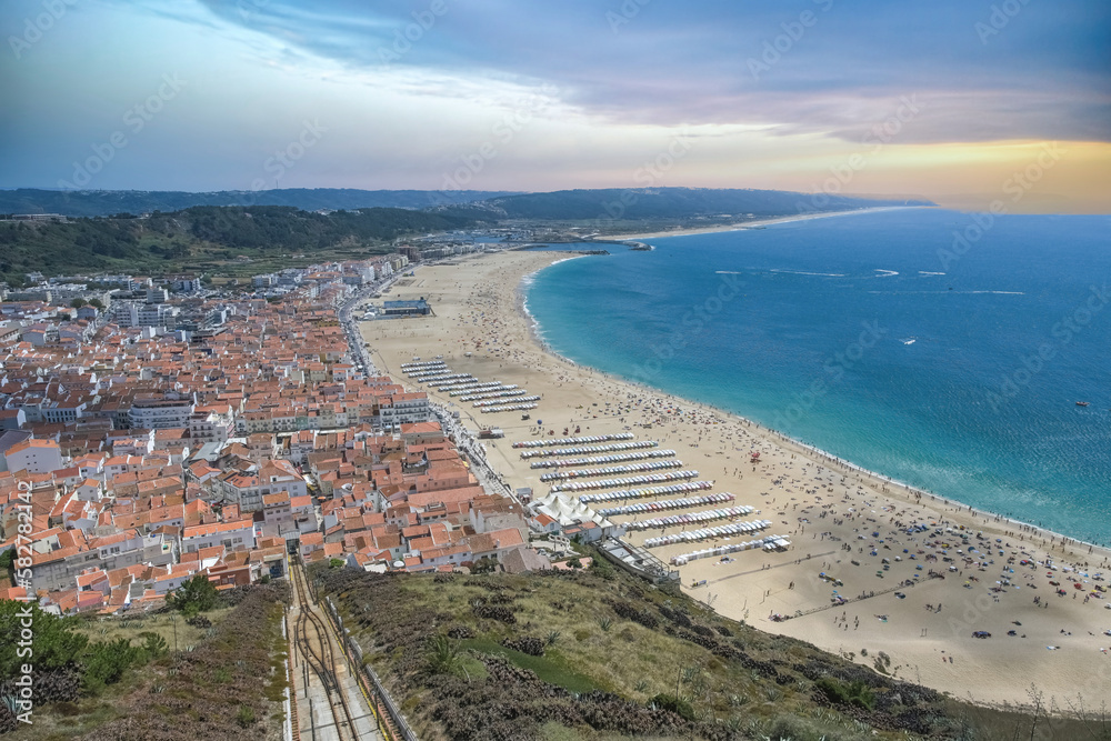 Nazare, beach resort in Portugal, during summer, aerial view of the bay
