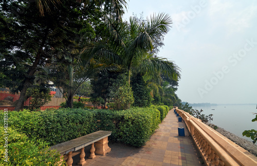 Beautifully decorated public park with lush green surroundings along the banks of Ganges river at Halisahar, West Bengal. Popularly known as Craig Park, this park is a popular travel spot. © suprabhat