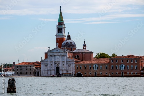 Beautiful shot of the Il Redentore and Santissimo Cathedral across the water in Venice, Italy