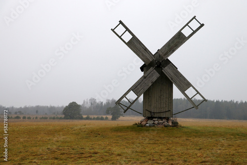 Old windmill on the field.