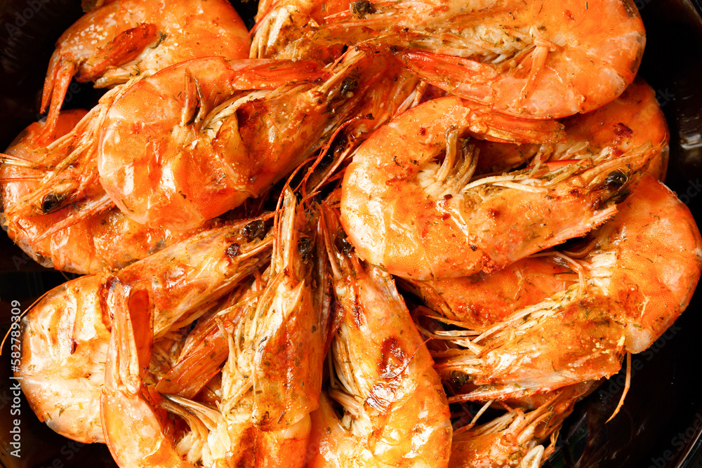 Fried shrimp on a dark background top view Fried shrimp on a dark background top view