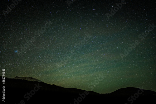 Sky full of stars over the mountains. No light pollution. Dark sky park. Bieszczady Mountains, Poland.