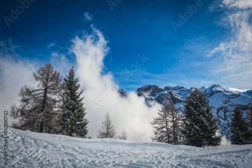 A beautiful view of Brenta Dolomites with fantastic clouds and Alps Madonna di Campiglio, Pinzolo, Italy. January 2023