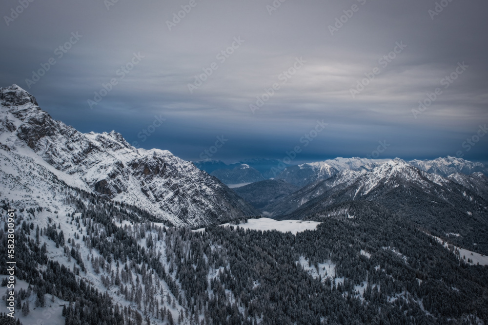 Skiing in Italy, Dolomites, Madonna di Campiglio, Pinzolo. Cloudy winter day in January 2023