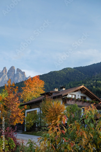 Wooden House at the Famous Santa Maddalena Village, Val di Funes valley, Trentino Alto Adige region, Italy  Beautiful View of the Dolomites Mountains in the Background © Jiratchaya