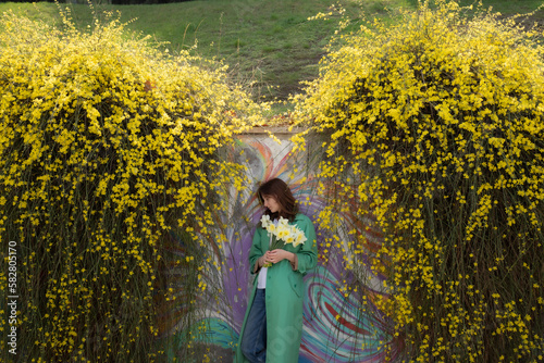 person in a field of sunflowers