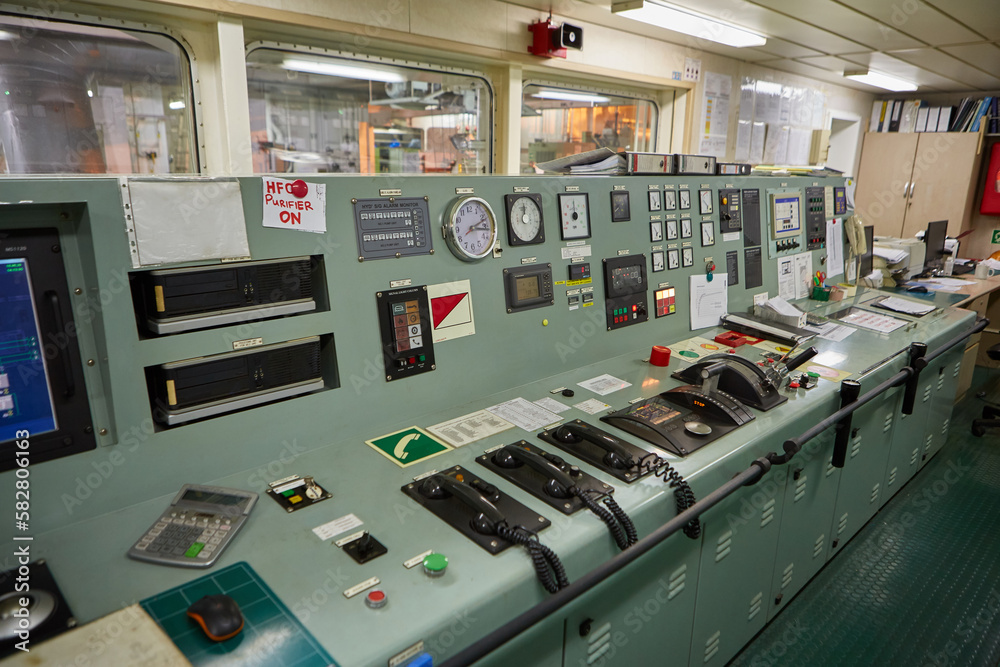 Interior of ship's engine room control compartment. The control instruments of the ship's engine.