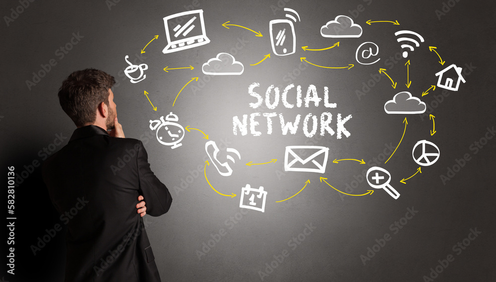 businessman drawing social media icons businessman drawing social media icons