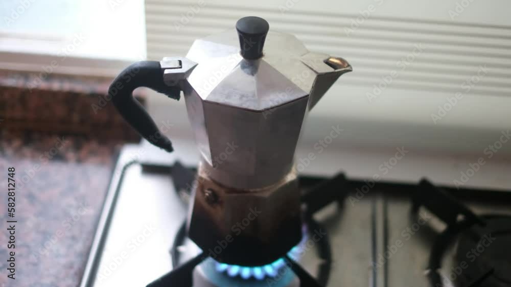 Freshly made coffee image with coffee maker, the moka pot is a stove