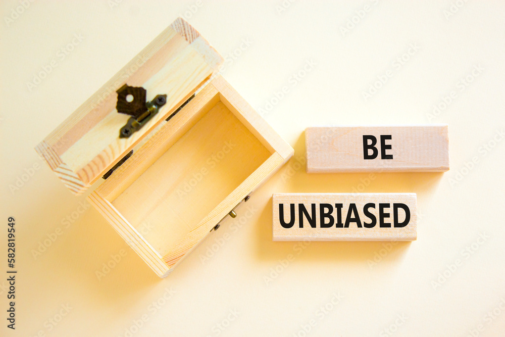 Be unbiased symbol. Concept words Be unbiased on wooden block. Beautiful white table white background. Empthy opened wooden chest. Business psychology be unbiased concept. Copy space.