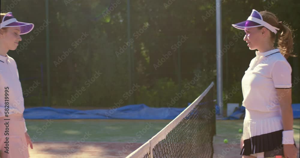 women walk, smile, hug, good tennis play slow motion. Sport active