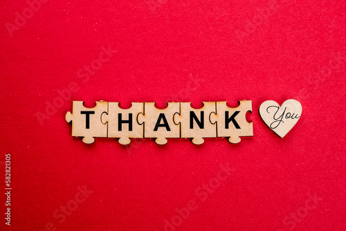 Thank you on red background