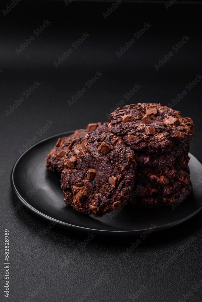 Delicious fresh crispy oatmeal cookies with chocolate and nuts Delicious fresh crispy oatmeal cookies with chocolate and nuts