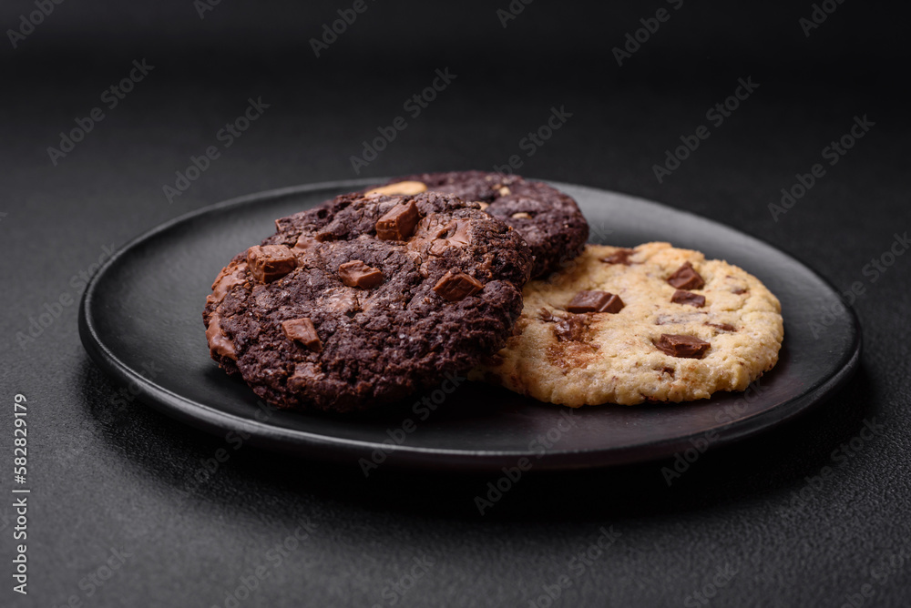 Delicious fresh crispy oatmeal cookies with chocolate and nuts Delicious fresh crispy oatmeal cookies with chocolate and nuts