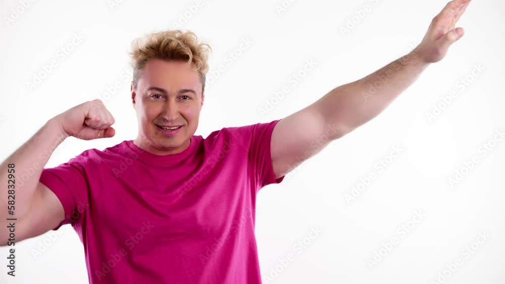 Muscles, strength and athletic man for sport, health and fitness. Happy smiling guy showing biceps with confident expression, bodybuilding, power. Studio shot isolated on white background. Muscles, strength and athletic man for sport, health and fitness. Happy smiling guy showing biceps with confident expression, bodybuilding, power. Studio shot isolated on white background.
