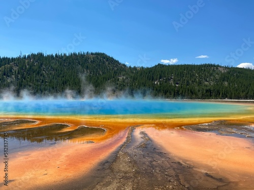 Colorful steam rise from grand prismatic spring in Yellowstone National Park 