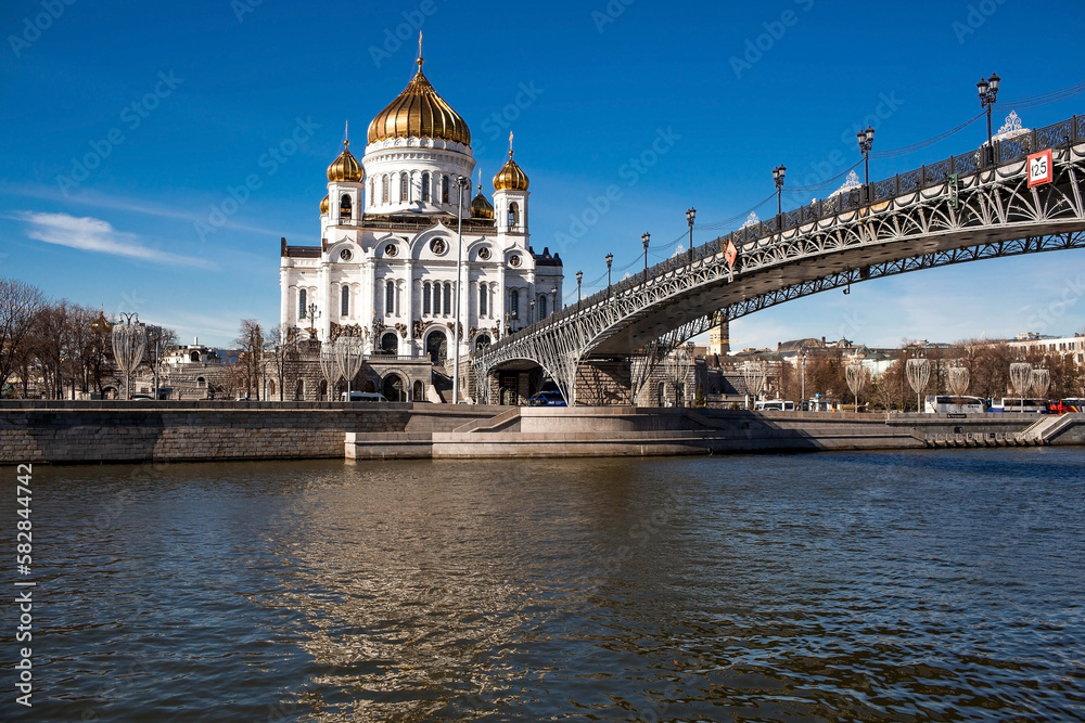 Russian Orthodox Cathedral - The Cathedral of Christ the Savior in Moscow against the blue sky on a sunny spring day. Russian Federation, Moscow.