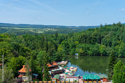 SOVATA, ROMANIA - AUGUST 24, 2022: Sovata city and Ursul lake resort. It is known for balneoclimateric and mud treatments. Sovata, Romania on August 24, 2022 photo