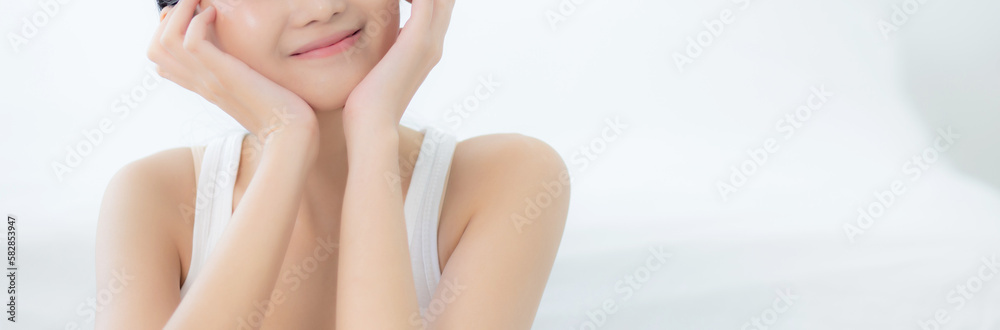 Beautiful young asian woman makeup of cosmetic, girl hand touch cheek on face and smiling attractive, facial of beauty perfect skincare with wellness and wrinkle, skin care and health concept. Beautiful young asian woman makeup of cosmetic, girl hand touch cheek on face and smiling attractive, facial of beauty perfect skincare with wellness and wrinkle, skin care and health concept.