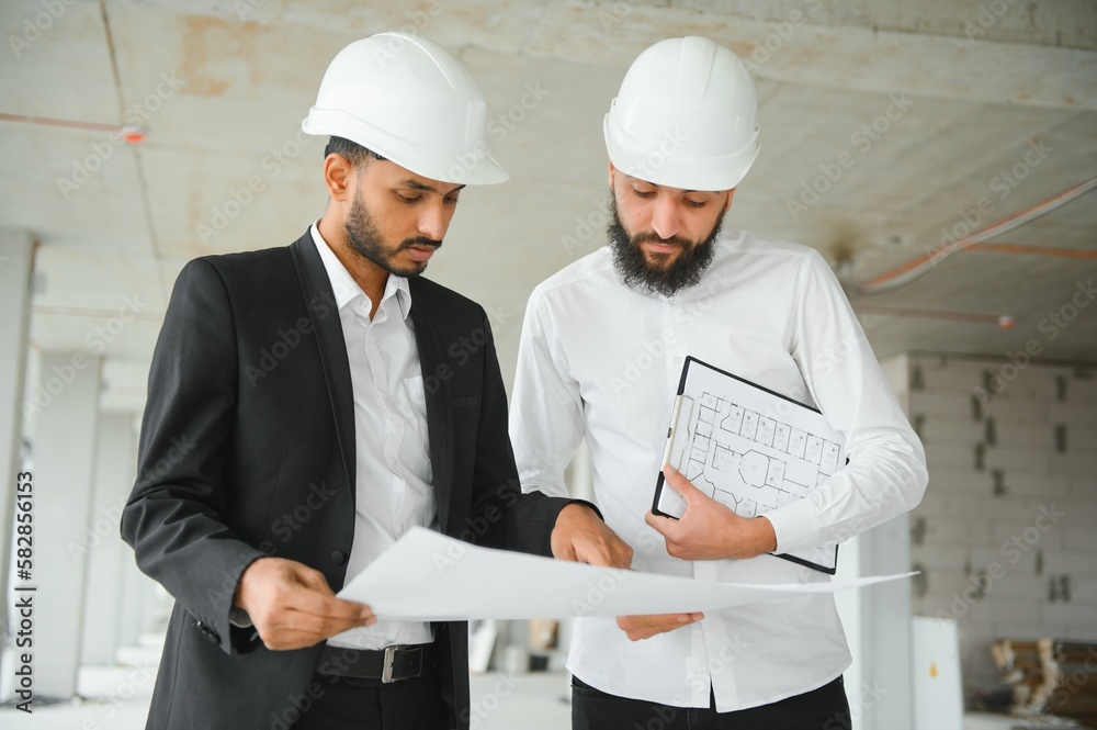 Multiethnic business team. Construction concept. Indian and Arab ...