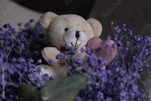teddy bear with flowers
